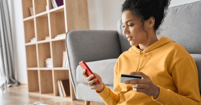 Women paying online shopping with credit card